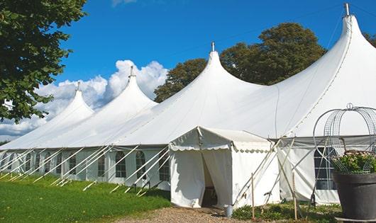 high-quality portable restrooms stationed at a wedding, meeting the needs of guests throughout the outdoor reception in Aledo